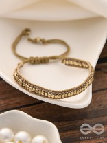 The Golden Glimmer- Beaded Knot Bracelet