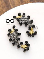 The Dual-Tone Embellished Fish Studs (Onyx Black)