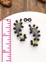 The Dual-Tone Embellished Fish Studs (Onyx Black)