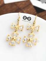 A Shimmery Statement Danglers - The Golden Charm Collection