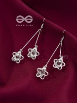 The Dangling Shimmery Star Earrings