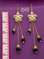 The floral augmented charm- Golden dangler earrings