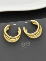 The Elegant Turns - Matte Finished Golden Hoops