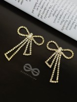 The Bedazzled Bowknots - Statement Golden Earrings