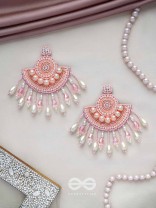 SURAMYA- THE PICTURESQUE CRESCENT- SEQUINS, GLASS BEADS AND STONE EMBROIDERED EARRINGS (SALMON PINK)