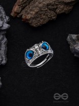 A KNOW-IT-OWL - BLUE EYED SILVER RING