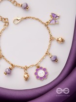 THE JOY OF LIVING - PURPLE CHARMED BRACELET