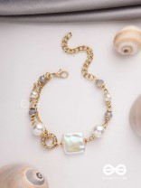 CLASSIC IVORY ALLURE - GOLDEN EMBELLISHED BRACELET WITH ANTI TARNISH COATING 