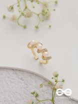 The Twisted Elegance - Cubic Zirconia Golden Ring (Adjustable)