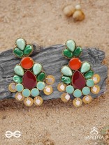 Vikṛtiśīla- Elegant Form-Chunky blue, green, and rust-colored stones with a distinctive golden-silver leaflet design