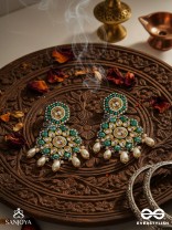 Vaidurya-Emerald Blossom- Firozi-colored glass stones earrings paired with golden and white accents, beads, and danglers