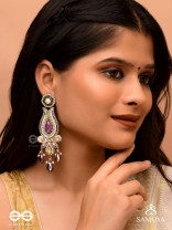 Divyaśhobhanā-Divine Splendour-Lotus-inspired embroidered design, adorned with purple and golden gem-studded motifs, Pearl and Beads.