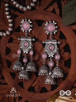 VIJAYAMUKTA-VICTORY PEARLS- REGAL OXIDIZED EARRINGS WITH A CENTRAL PURPLE STONE AND LAYERED JHUMKAS