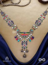 Prema raga- Love colour- Enamelled oxidized neckpiece embellished with beads, mirror and dangling jhumka.