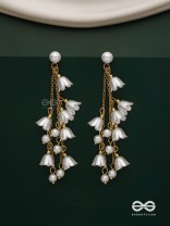 Strings of promise - Metallic dangling white rose earrings  