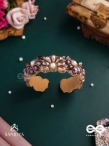 SHYAMALIKA – DARK BLOOM A FLORAL-INSPIRED BRACELET ADORNED WITH DARK-HUED GEMSTONES AND PEARLS