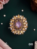 KANAKA PUSHPA – GOLDEN FLOWER EMBROIDERED FLOWER-SHAPED RING ADORNED WITH YELLOW GEMS AND PEARLS, GIVING A GOLDEN GLOW