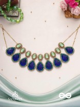 JALANEELINI - WATER LIKE BLUE ELEGANCE - BLUE TEARDROP SHAPES, GEMSTONES WITH GOLDEN EBELLISHED NECKLACE
