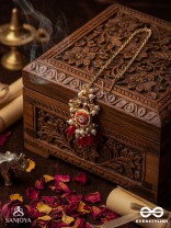 TRADITIONAL RED ENAMELLED POLKI MAANGTIKA WITH LUSTROUS BEADS AND PEARLS