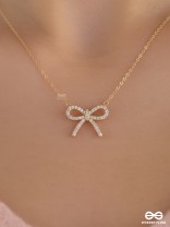 TIED IN GOLD- MINIMALIST BOW NECKPIECE