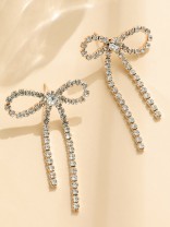 GOLDEN GLIMMER BOW -  GRACEFUL AND SPARKLING BOW EARRINGS