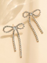 GOLDEN GLIMMER BOW -  GRACEFUL AND SPARKLING BOW EARRINGS
