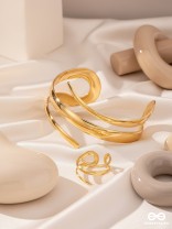 AURIC SWIRL - CONTEMPORARY GOLDEN TWIST RING+ TWISTED GLEAM- SLEEK AND POLISHED METALLIC CUFF BRACELET