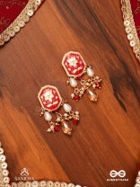 ABHARANI - THE ADORNED QUEEN- FINE TRADITIONAL KUNDAN EARRINGS WITH RED ENAMEL WORK, PEARL AND BEADS