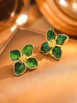 EMERALD BLOOM- STATEMENT FLORAL STUDS