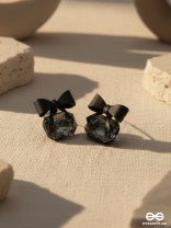 MIDNIGHT MUSE – DARK CRYSTAL STUDS WITH PLAYFUL BOW TOPS