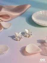 WINGED WHIMSY – DELICATE BUTTERFLY HOOPS WITH SHIMMERING PEARLS