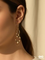INFINITY DRIFT – FLUID SCULPTURAL DROP EARRINGS