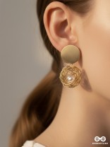 Mirror reflection- pearl in a cage of gold earrings