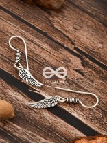 The Angel Wing Danglers - Tiny Trinket Earrings