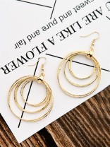 The Shimmery Circles - Golden Elegant Earrings