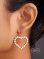 The pearly heart of desire - Golden dangler earring