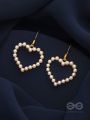 The pearly heart of desire - Golden dangler earring