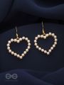 The pearly heart of desire - Golden dangler earring