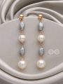 The Twilight Charm- Golden Pearl Earrings