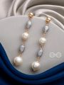 The Twilight Charm- Golden Pearl Earrings