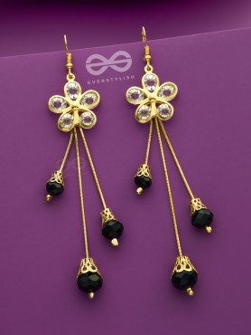The floral augmented charm- Golden dangler earrings