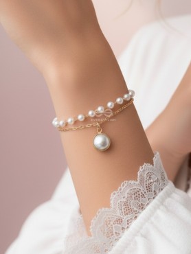 The Snow Globe- Gold Pearl Bracelet