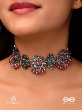 RAKTASHREE– RED ELEGANCE : OXIDIZED CHOKER WITH INTRICATE WORK AND BOLD RED ACCENTS, PERFECT FOR A TRADITIONAL LOOK