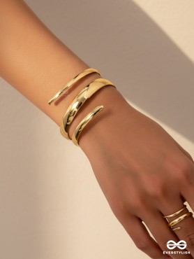 AURIC SWIRL - CONTEMPORARY GOLDEN TWIST RING+ TWISTED GLEAM- SLEEK AND POLISHED METALLIC CUFF BRACELET