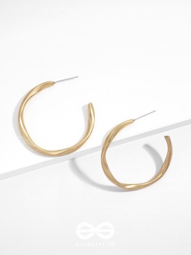 The Subtle Affirmation Golden Twists Hoop Earrings