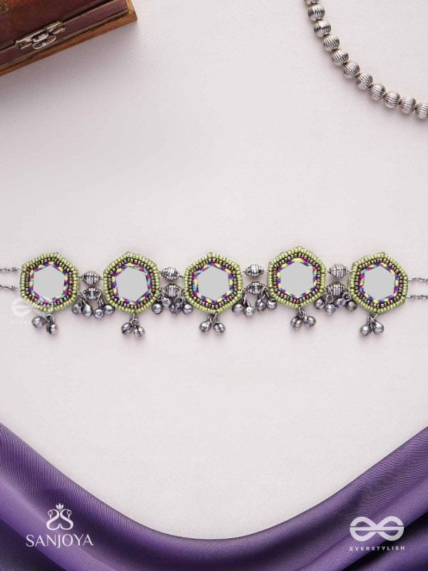 Chāyāmālā-Reflective choker- oxidized choker featuring intricate beadwork, mirrors, ghungroo (small bells), and thread details