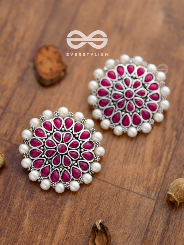 The classy Desire perfect pearl Embellished Statement Studs (Ruby Red)