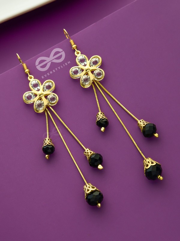 The floral augmented charm- Golden dangler earrings