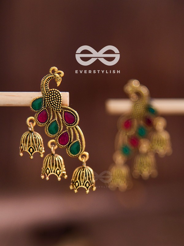 The magnificent meryll Intricate Peacock jhumkis (Golden)
