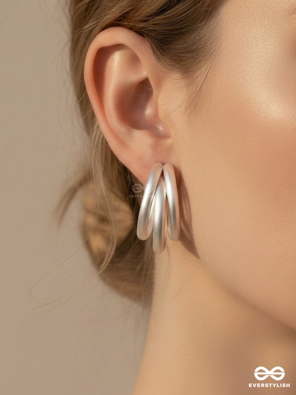 THE ELEGANT TURNS - MATTE FINISHED SILVER HOOPS